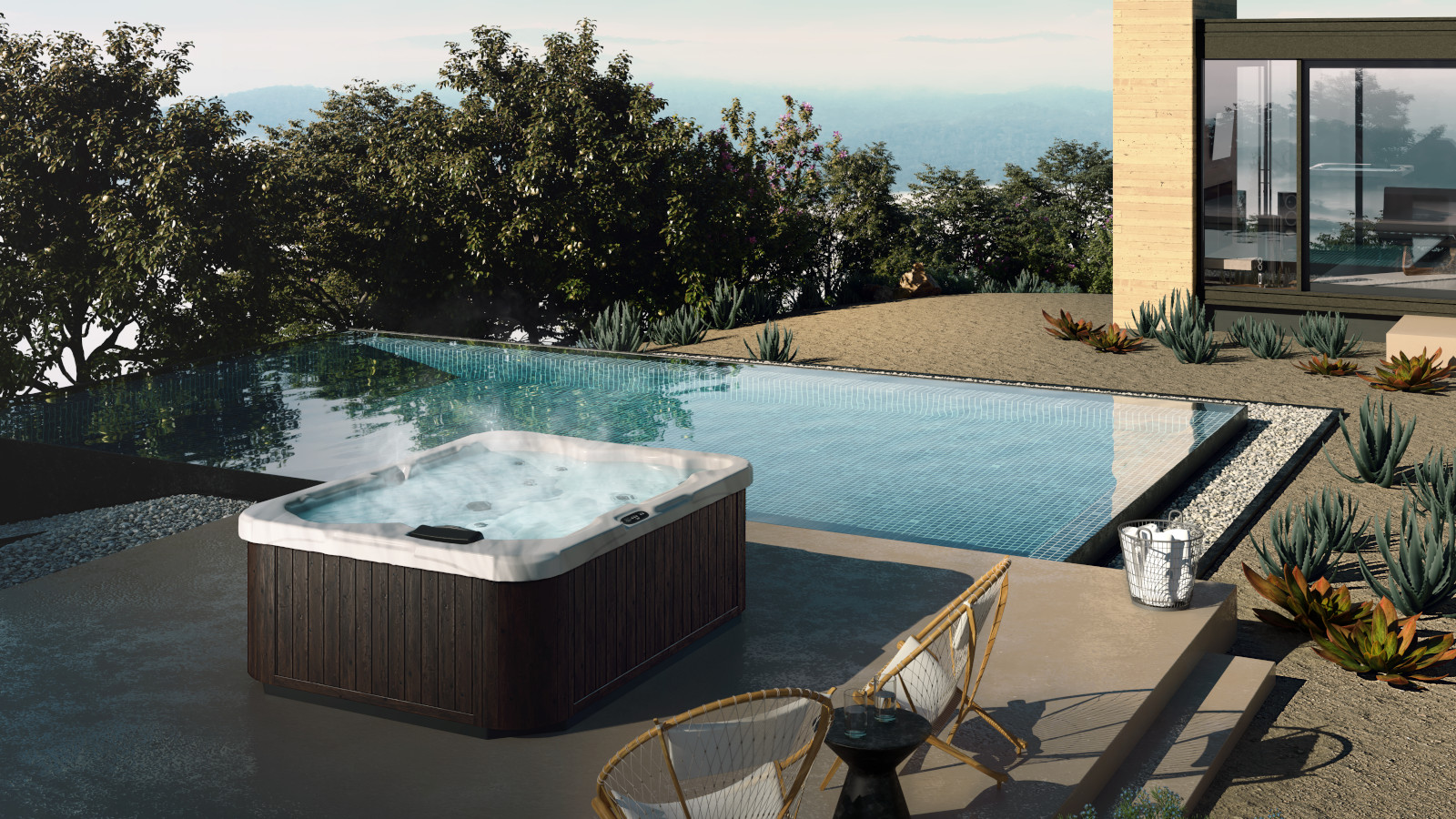 Aussen Whirlpool Serenade steht direkt an einem Swimmingpool mit schöner Aussicht