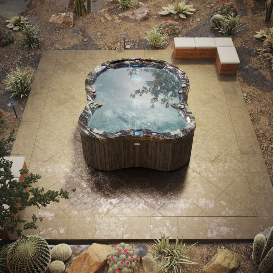 Der Outdoor Whirlpool Amore Bay, befüllt in einer mediterranen Umgebung